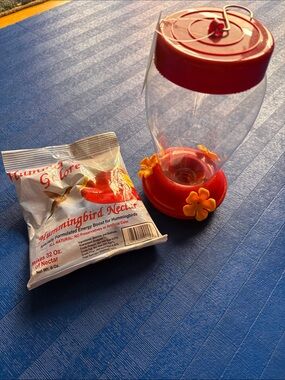 Never Used Hummingbird Red Nectar Feeder with Food